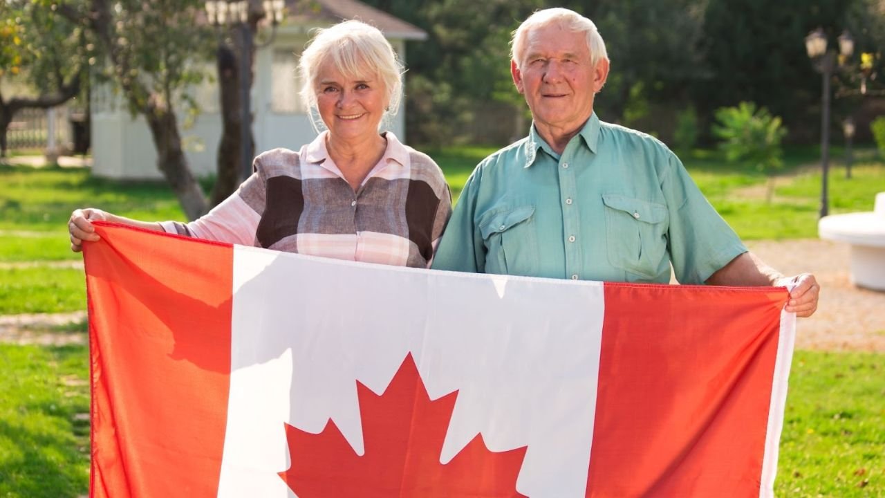Senior Citizens Holding Canada Flag